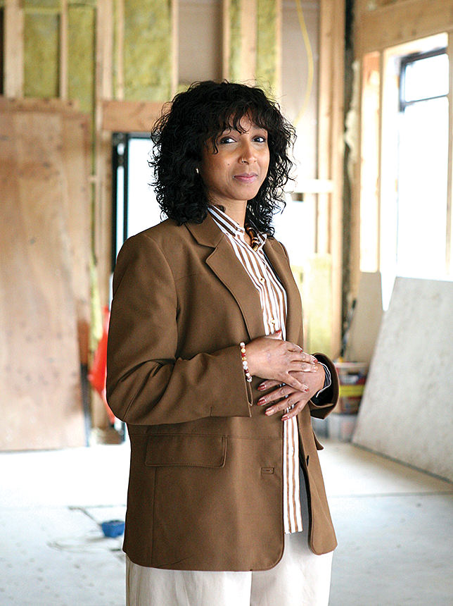 Raquel Semedo, 39, inside the unfinished interior of what will soon become Lisboa Café on Dorchester Ave. in Savin Hill. The café and restaurant concept has long been a dream for Semedo, who has spent many years in management roles for the hospitality and restaurant industry.