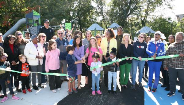 Children from the neighborhood joined Mayor Wu in cutting the ribbon on the new Walsh Park last Friday morning following $4 million in renovations to the facility. Seth Daniel photo