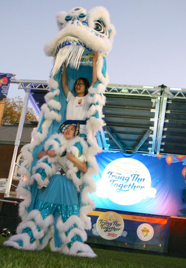 Vovinam Lion Dancers stood tall in their lion costume during the start of the lantern parade at Saturday’s Mid-Autumn (Trung Thu Together) Festival on Town Field. Seth Daniel photo