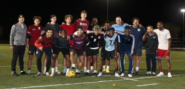 The players of Dorchester City FC meet up twice a week at various city parks to prep for their weekend game days. Above, they are shown at Almont Park in Mattapan. Cassidy McNeeley photo